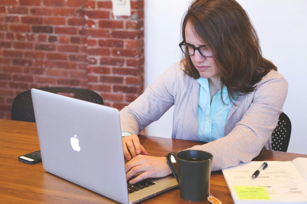 Woman looking at her laptop