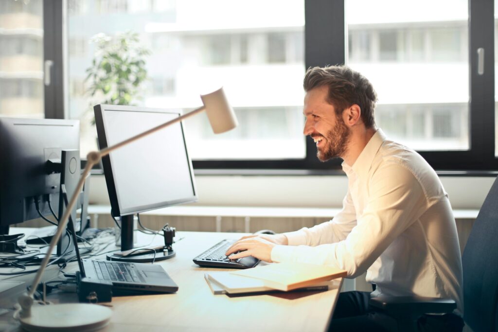 Man using his desktop during work hours